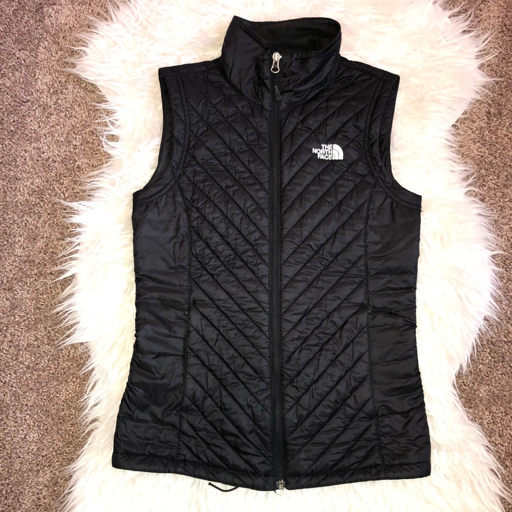 The north face vest black light puffer women’s xs